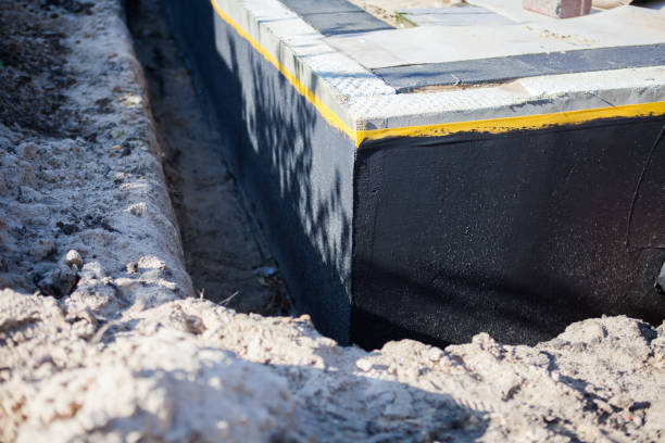 Professional Waterproofing technician working in Tiro, OH
